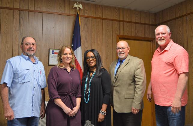 0001a: Assistant Auditor Talita Coleman was selected as the new Grimes County Human Resources Director at a Special Meeting of Commissioners Court March 12. Pictured, L-R: Commissioner David Dobyanski, Talita Coleman, Commissioner Barbara Walker, Judge Joe Fauth and Commissioner Chad Mallett. Present for the vote but not for the photo was Commissioner Phillip Cox.