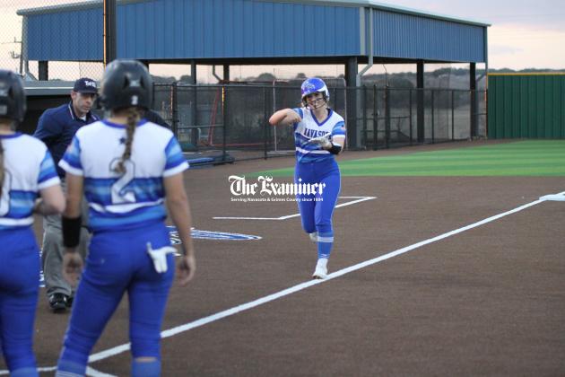 Examiner photos by Matthew Ybarra   Trinity Loukanis had the Lady Rattlers first big swing of the season, a three-run homerun in the bottom of the second-inning against Montgomery. Loukanis finished 2-2 at the plate with four RBI's, but Montgomery came back winning 9-5. 