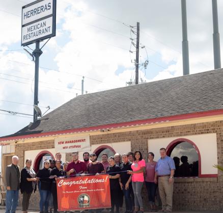 Examiner photo by Erica Grifaldo                    Herrera’s Mexican Restaurant had an official ribbon cutting Friday, Aug. 23 at their location, 8734 N Hwy 6 Loop in Navasota. The restaurant formerly known as Erick’s Mexican Restaurant is under 